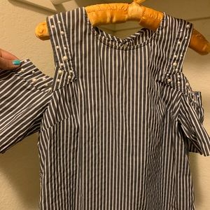 Blouse with shoulder cutout